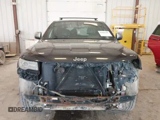 2014 Jeep Grand Cherokee Limited with VIN 1C4RJFBT6EC151557, listed as a IAAI auction lot 42691102 with 204,462 mi miles and . Bid and sale history available at DreamBid. Image 12.