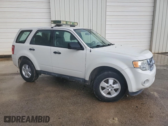 2011 Ford Escape XLS with VIN 1FMCU0C74BKC27897, listed as a Copart auction lot 63084415 with 116,423 mi miles and Clean title. Bid and sale history available at DreamBid. Image 4.