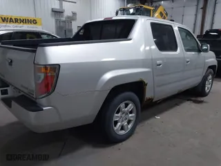 2006 Honda Ridgeline RTL with VIN 2HJYK16546H520899, listed as a IAAI auction lot 41899874 with 3,202,741 mi miles. Bid and sale history available at carsss.com. Image 4.
