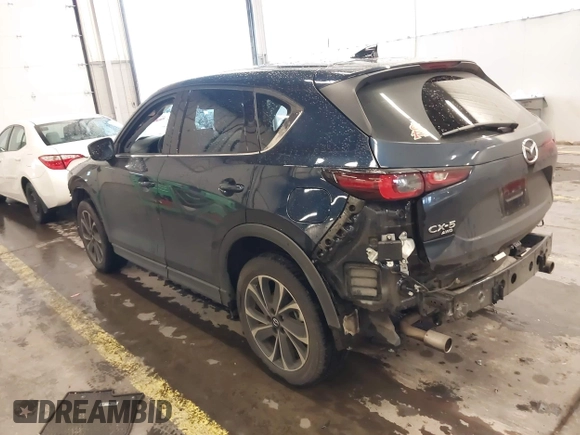 2023 Mazda CX-5 2.5 S Premium Plus Package with VIN JM3KFBEM0P0157074, listed as a IAAI auction lot 41215076 with 37,323 mi miles. Bid and sale history available at carsss.com. Image 3.