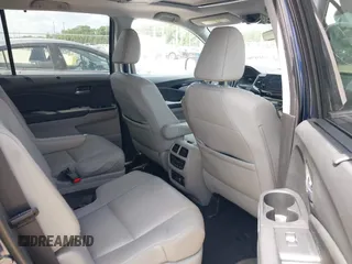 2022 Honda Pilot Touring 7-Passenger with VIN 5FNYF5H61NB019768, listed as a IAAI auction lot 42438780 with Not provided miles and . Bid and sale history available at DreamBid. Image 8.