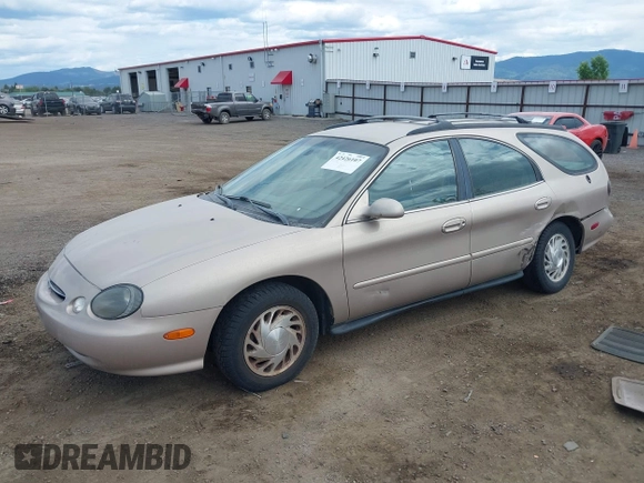 1998 Ford Taurus with VIN 1FAFP57U8WG275844, listed as a IAAI auction lot 42426107 with 318,654 mi miles and . Bid and sale history available at DreamBid. Image 2.
