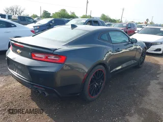 2016 Chevrolet Camaro 1LT with VIN 1G1FA1RS6G0131650, listed as a IAAI auction lot 42080401 with 127,108 mi miles. Bid and sale history available at carsss.com. Image 4.