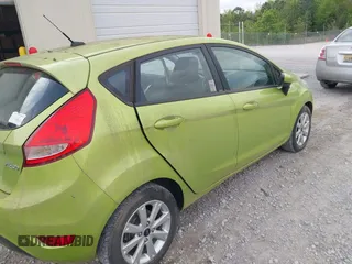 2011 Ford Fiesta SE with VIN 3FADP4EJXBM164397, listed as a IAAI auction lot 42046591 with 118,953 mi miles. Bid and sale history available at carsss.com. Image 6.