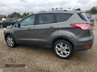 2016 Ford Escape Titanium with VIN 1FMCU9J94GUA43063, listed as a Copart auction lot 53875085 with 71,227 mi miles and Salvage Title. Bid and sale history available at DreamBid. Image 2.
