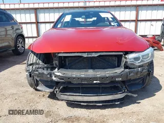 2015 BMW M4 with VIN WBS3R9C5XFK333441, listed as a IAAI auction lot 41774716 with 76,224 mi miles. Bid and sale history available at carsss.com. Image 13.