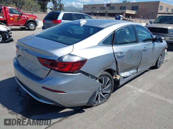 2019 Honda Insight Touring with VIN 19XZE4F93KE007489, listed as a IAAI auction lot 41943334 with 118,689 mi miles and . Bid and sale history available at DreamBid. Image 4.