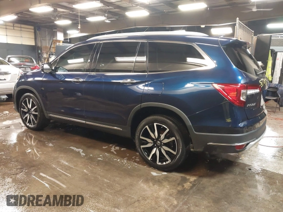 2022 Honda Pilot Touring 7-Passenger with VIN 5FNYF6H65NB052164, listed as a IAAI auction lot 41641601 with 51,700 mi miles. Bid and sale history available at carsss.com. Image 3.