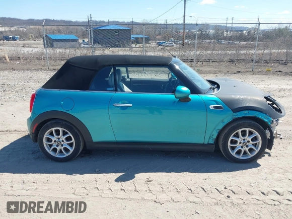 2016 MINI Convertible z VIN WMWWG5C53G3C18842, wystawiony jako IAAI lot #41864596 z przebiegiem 91 253 mil mil oraz . Historia ofert i sprzedaży dostępna na DreamBid. Obrazek 13.