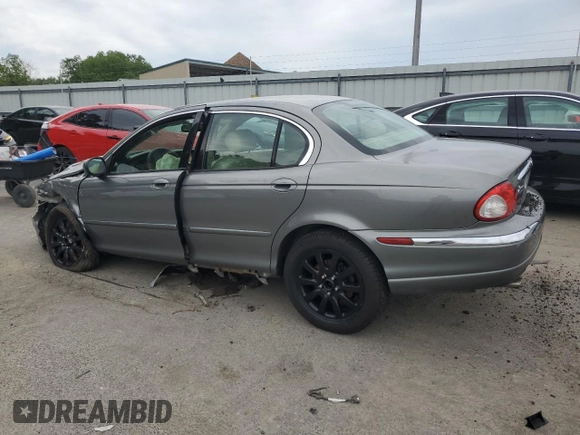 2003 Jaguar X-Type z VIN SAJEB52D33XD54978, wystawiony jako Copart lot #58027805 z przebiegiem Nie podano mil oraz Szkoda całkowita • Salvage title. Historia ofert i sprzedaży dostępna na DreamBid. Obrazek 2.
