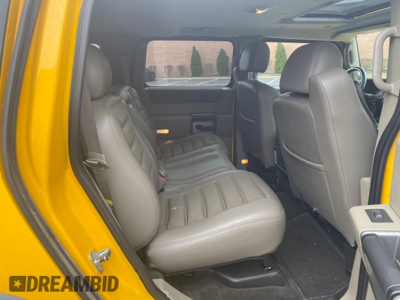 2003 Hummer H2 with VIN 5GRGN23UX3H112710, listed as a Copart auction lot 53854185 with 64,686 mi miles and Salvage Title. Bid and sale history available at carsss.com. Image 6.