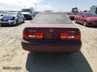 1997 Lexus ES 300 Luxury Sport Sdn with VIN JT8BF22G0V0030408, listed as a Copart auction lot 66811844 with 185,314 mi miles and Salvage Title. Bid and sale history available at carsss.com. Image 6.