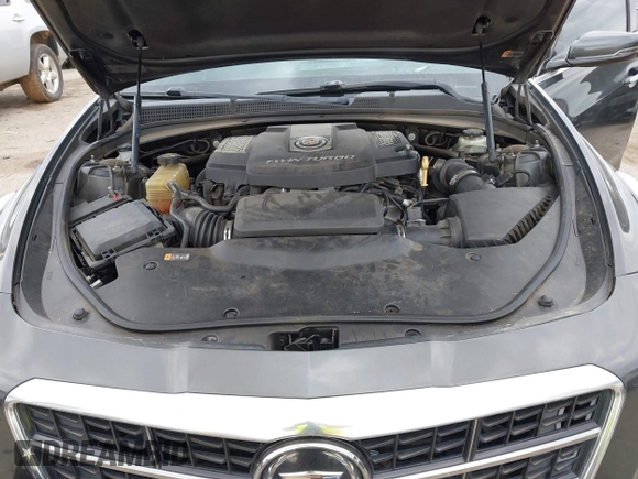 2014 Cadillac CTS Vsport Premium RWD z VIN 1G6AV5S8XE0175517, wystawiony jako IAAI lot #41126885 z przebiegiem 140 667 mil mil oraz . Historia ofert i sprzedaży dostępna na DreamBid. Obrazek 10.