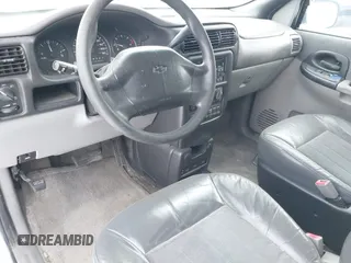 2002 Chevrolet Venture Warner Bros 1SE Pkg with VIN 1GNDX13E82D311155, listed as a IAAI auction lot 41622674 with 196,101 mi miles. Bid and sale history available at carsss.com. Image 12.