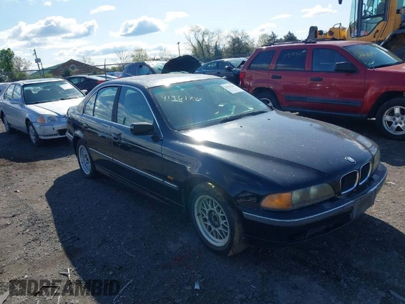 2000 BMW 5 Series 528iA with VIN WBADM6348YGU11038, listed as a IAAI auction lot 41961847 with 195,493 mi miles. Bid and sale history available at carsss.com. Image 1.