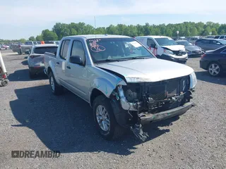 2014 Nissan Frontier SV z VIN 1N6AD0EV0EN712710, wystawiony jako IAAI lot #42230060 z przebiegiem 68 057 mil mil oraz . Historia ofert i sprzedaży dostępna na DreamBid. Obrazek 1.