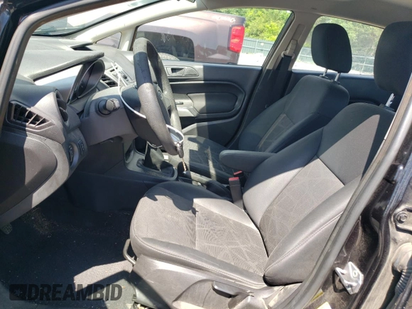2012 Ford Fiesta SE z VIN 3FADP4BJ5CM195837, wystawiony jako Copart lot #57363165 z przebiegiem 108 003 mil mil oraz Szkoda całkowita • Salvage title. Historia ofert i sprzedaży dostępna na DreamBid. Obrazek 7.