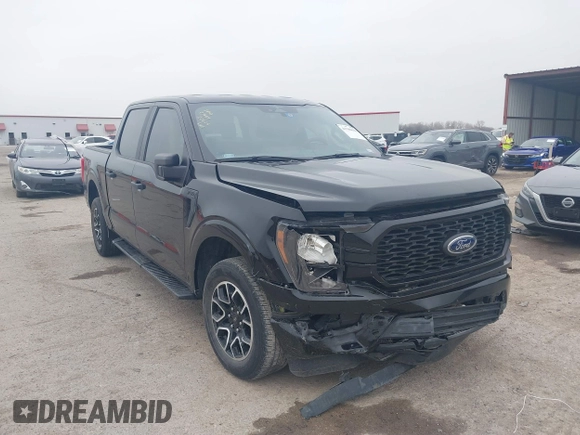 2023 Ford F-150 XL with VIN 1FTEW1C55PKD01184, listed as a IAAI auction lot 41700658 with 18,804 mi miles. Bid and sale history available at carsss.com. Image 1.