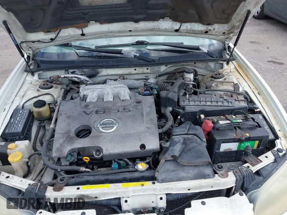 2003 Nissan Maxima SE z VIN JN1DA31DX3T501453, wystawiony jako IAAI lot #42116346 z przebiegiem 127 364 mil mil oraz . Historia ofert i sprzedaży dostępna na DreamBid. Obrazek 10.