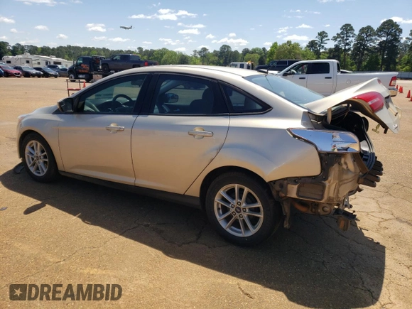 2017 Ford Focus SE with VIN 1FADP3F26HL295581, listed as a Copart auction lot 52158745 with 104,453 mi miles and Salvage title. Bid and sale history available at DreamBid. Image 2.