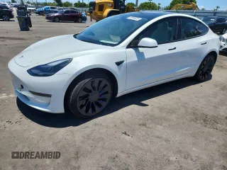 2023 Tesla Model 3 Performance z VIN 5YJ3E1EC4PF697529, wystawiony jako Copart lot #60866525 z przebiegiem 7 601 mil mil oraz Szkoda całkowita • Salvage title. Historia ofert i sprzedaży dostępna na DreamBid. Obrazek 1.