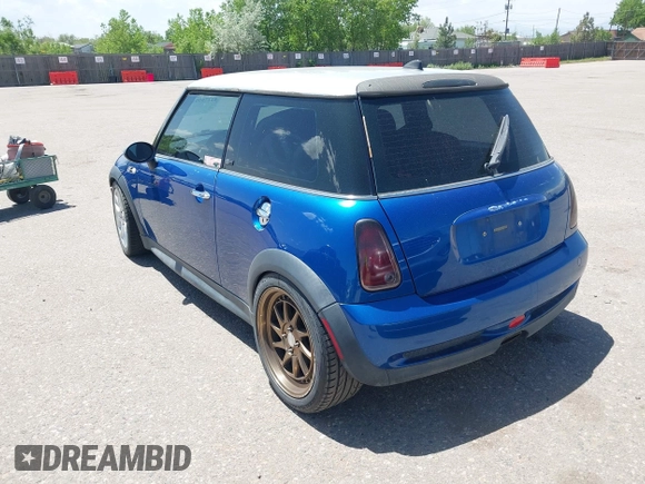 2006 MINI Hardtop S with VIN WMWRE33576TL24276, listed as a IAAI auction lot 42278094 with 148,269 mi miles and . Bid and sale history available at DreamBid. Image 3.