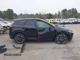 2016 Mazda CX-5 Grand Touring with VIN JM3KE4DY1G0685449, listed as a IAAI auction lot 41162840 with 134,525 mi miles. Bid and sale history available at carsss.com. Image 14.