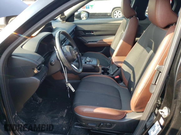 2022 Mazda MX-30 Premium Plus z VIN JM1DRADB6N0101074, wystawiony jako Copart lot #68379044 z przebiegiem 43 559 mil mil oraz Szkody całkowita. Historia ofert i sprzedaży dostępna na DreamBid. Obrazek 7.