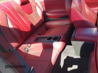 2017 Infiniti Q60 Red Sport 400 with VIN JN1FV7ELXHM701112, listed as a IAAI auction lot 41862580 with 89,385 mi miles and . Bid and sale history available at carsss.com. Image 8.