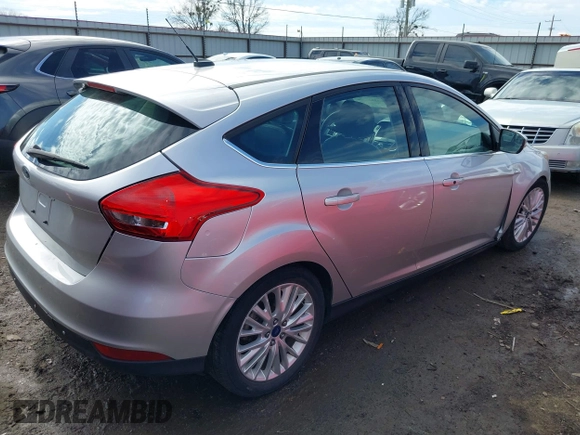 2017 Ford Focus Titanium with VIN 1FADP3N26HL309903, listed as a IAAI auction lot 41642306 with 107,762 mi miles and . Bid and sale history available at carsss.com. Image 4.