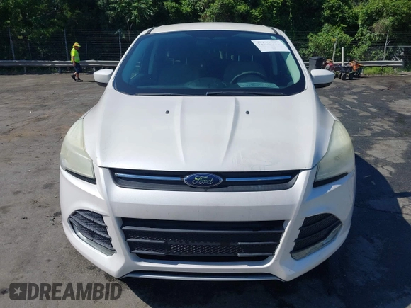 2013 Ford Escape SE with VIN 1FMCU0GX2DUB85361, listed as a IAAI auction lot 42552881 with 211,032 mi miles and . Bid and sale history available at DreamBid. Image 12.