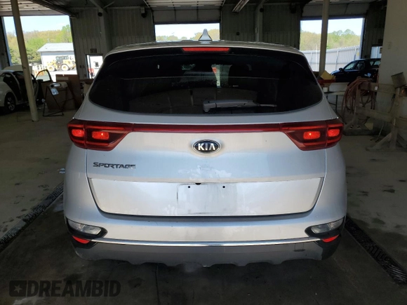 2021 Kia Sportage LX with VIN KNDPMCAC5M7862219, listed as a Copart auction lot 54098215 with 83,736 mi miles and Salvage Title. Bid and sale history available at carsss.com. Image 6.
