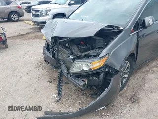 2015 Honda Odyssey Touring Elite with VIN 5FNRL5H99FB089642, listed as a IAAI auction lot 42591786 with 100,755 mi miles and . Bid and sale history available at DreamBid. Image 6.