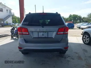 2019 Dodge Journey SE with VIN 3C4PDCBB0KT848601, listed as a IAAI auction lot 41991558 with 76,272 mi miles and . Bid and sale history available at DreamBid. Image 17.