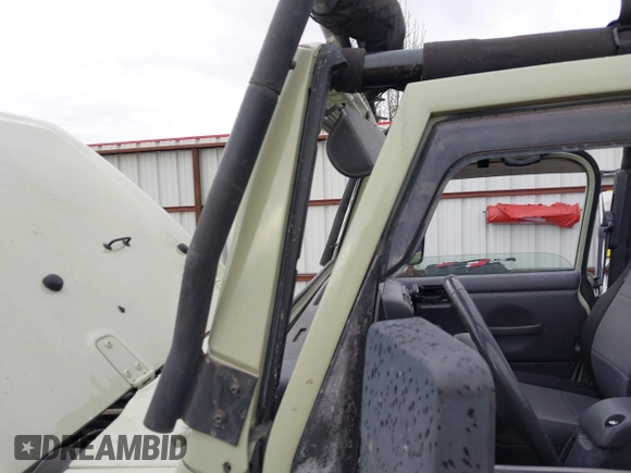 2001 Jeep Wrangler Sport with VIN 1J4FA49S91P354668, listed as a IAAI auction lot 41883227 with 197,043 mi miles and . Bid and sale history available at DreamBid. Image 6.