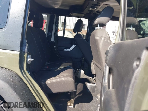 2015 Jeep Wrangler Unlimited Rubicon with VIN 1C4BJWFG0FL623431, listed as a IAAI auction lot 41651317 with 105,508 mi miles. Bid and sale history available at carsss.com. Image 8.