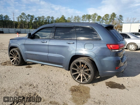 2020 Jeep Grand Cherokee Overland with VIN 1C4RJFCG8LC414033, listed as a Copart auction lot 87403024 with 55,111 mi miles and Salvage Title. Bid and sale history available at carsss.com. Image 2.