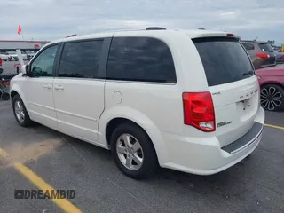 2011 Dodge Grand Caravan Crew with VIN 2D4RN5DG1BR725938, listed as a IAAI auction lot 42213308 with 162,894 mi miles and . Bid and sale history available at DreamBid. Image 3.