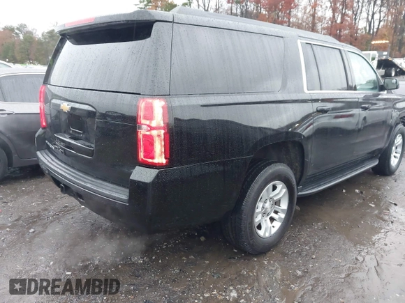 2019 Chevrolet Suburban LS with VIN 1GNSCGKC5KR321327, listed as a IAAI auction lot 41069977 with 282,308 mi miles and . Bid and sale history available at DreamBid. Image 4.