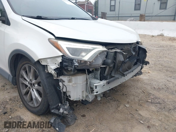 2016 Toyota RAV4 Limited with VIN JTMYFREV2GJ065656, listed as a IAAI auction lot 42575320 with 124,648 mi miles and . Bid and sale history available at DreamBid. Image 18.