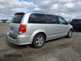2012 Dodge Grand Caravan SXT with VIN 2C4RDGCG5CR327937, listed as a Copart auction lot 52905955 with 168,382 mi miles and Salvage Title. Bid and sale history available at DreamBid. Image 3.