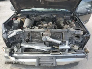 1999 Chevrolet Tahoe z VIN 3GNEC18R3XG165012, wystawiony jako Copart lot #75803204 z przebiegiem 227 608 mil mil oraz Szkoda całkowita • Salvage title. Historia ofert i sprzedaży dostępna na DreamBid. Obrazek 12.