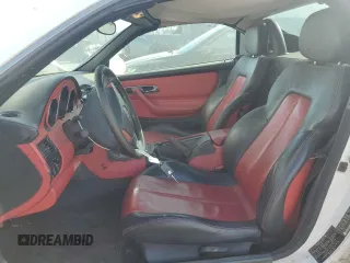 1998 Mercedes-Benz SLK-Class with VIN WDBKK47F1WF015342, listed as a Copart auction lot 77369564 with 192,528 mi miles and Clean Title. Bid and sale history available at carsss.com. Image 7.