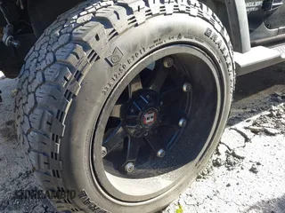 2012 Jeep Wrangler Unlimited Sport with VIN 1C4BJWDG8CL246829, listed as a IAAI auction lot 41816197 with 198,502 mi miles. Bid and sale history available at carsss.com. Image 19.