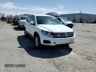 2014 Volkswagen Tiguan SE with VIN WVGAV3AX0EW614369, listed as a Copart auction lot 57664045 with 85,504 mi miles and Salvage title. Bid and sale history available at DreamBid. Image 14.