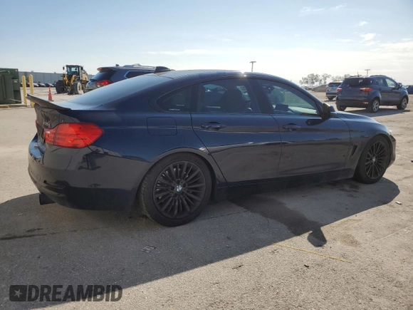 2015 BMW 4 Series 435i xDrive with VIN WBA4B3C51FGV48848, listed as a Copart auction lot 88529755 with 75,509 mi miles and Salvage Title. Bid and sale history available at DreamBid. Image 3.