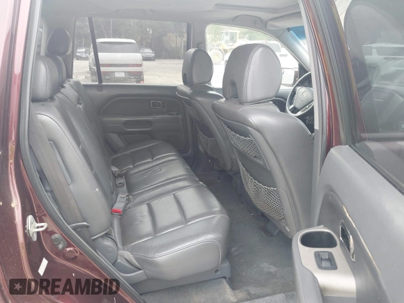 2007 Honda Pilot EX-L with VIN 2HKYF18597H513543, listed as a IAAI auction lot 42509483 with 201,778 mi miles and . Bid and sale history available at DreamBid. Image 8.