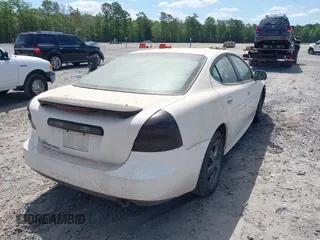 2006 Pontiac Grand Prix with VIN 2G2WP552861204284, listed as a IAAI auction lot 42145122 with 184,633 mi miles. Bid and sale history available at carsss.com. Image 4.