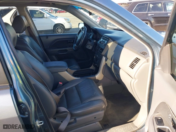 2007 Honda Pilot EX-L with VIN 5FNYF285X7B045780, listed as a IAAI auction lot 41324224 with 168,911 mi miles. Bid and sale history available at carsss.com. Image 5.