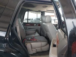 2004 Lincoln Navigator Luxury with VIN 5LMFU27R04LJ16634, listed as a IAAI auction lot 41922950 with 125,080 mi miles. Bid and sale history available at carsss.com. Image 8.
